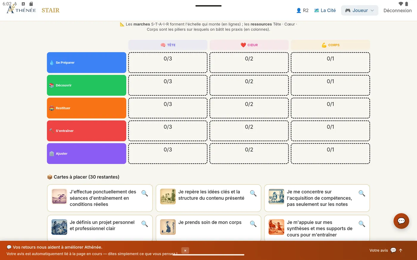 STAIR : le plateau du serious game, les cinq marches et les cartes Praxis à placer